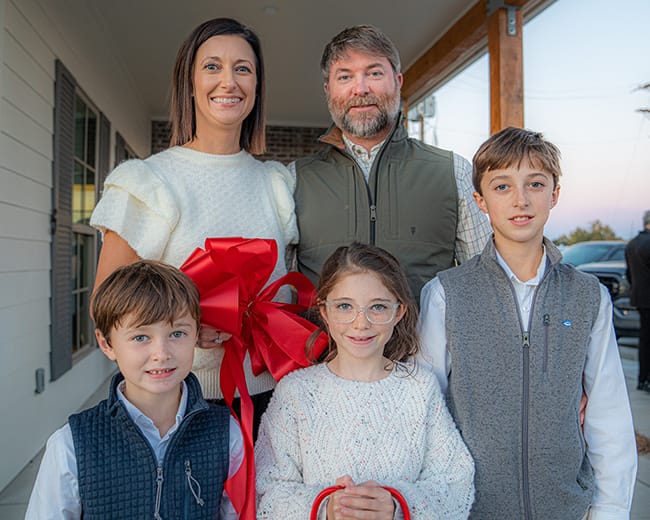 Photo of Dr. Bridget, her spouse, and 3 children.